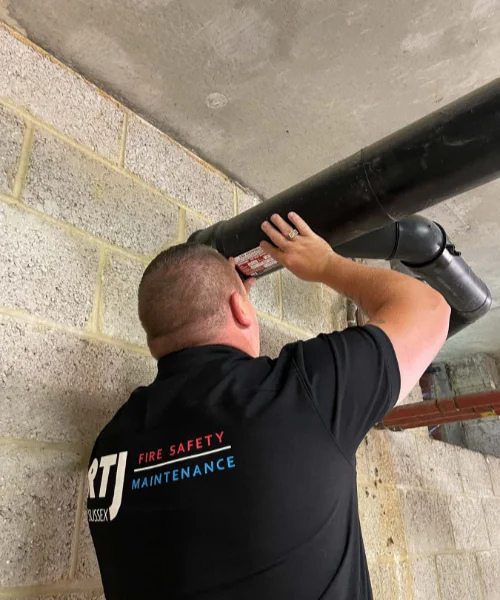 Legal Requirements and Compliance Roy of RTJ inspecting pipes